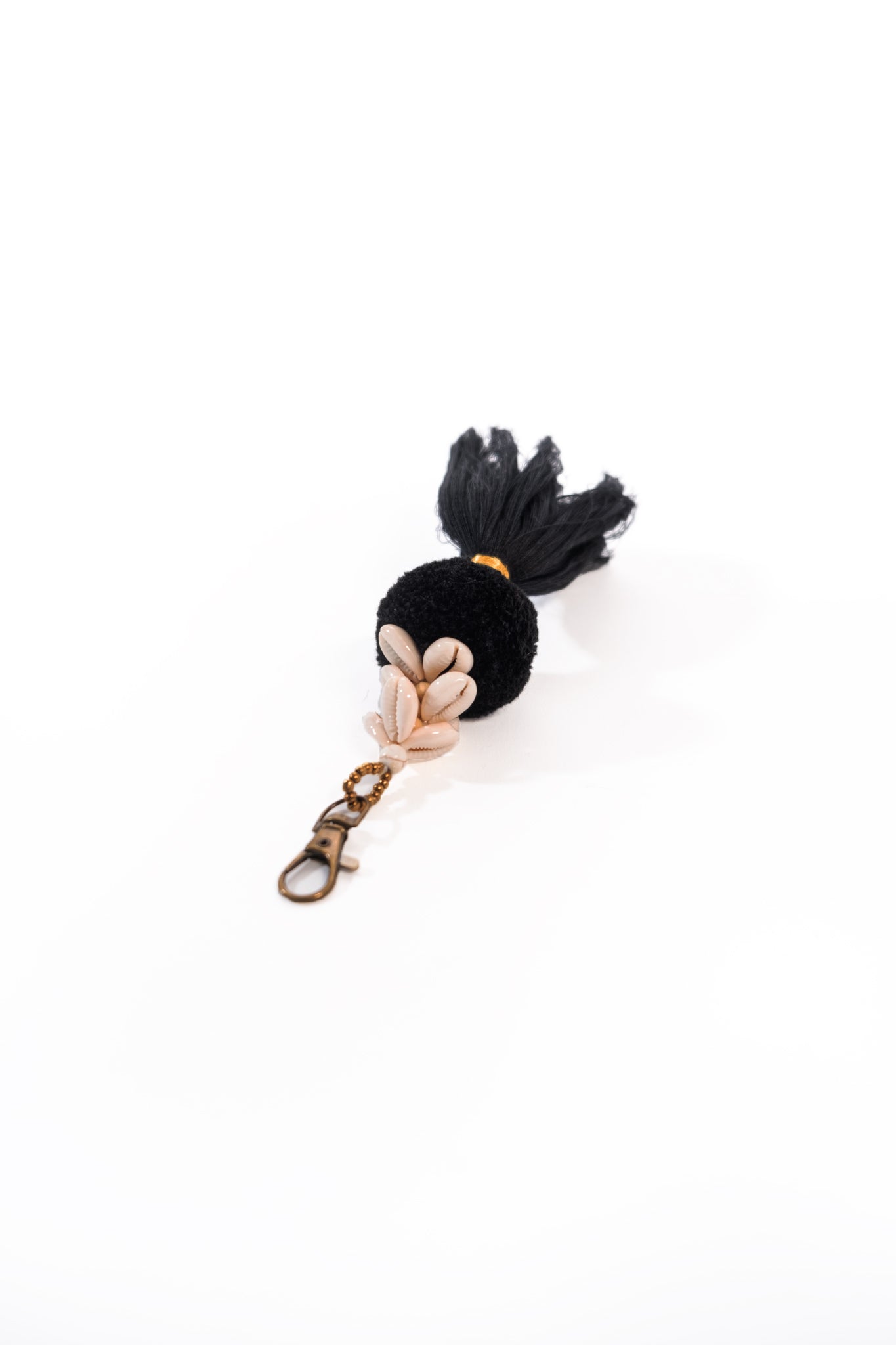 Keyring with black Pom pom tassel and Cowrey shells